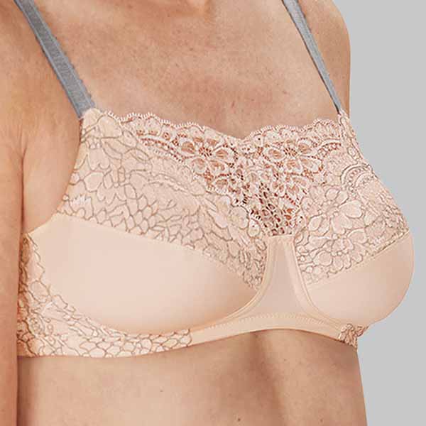 Perspective side close-up of the Amoena Alina soft wireless mastectomy bra a showing lace to the cup, cleavage and band.