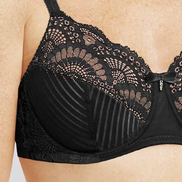Front close-up of the Amoena Karolina padded wireless bra showing lined lace to the upper cup and pattern fabric underneath.