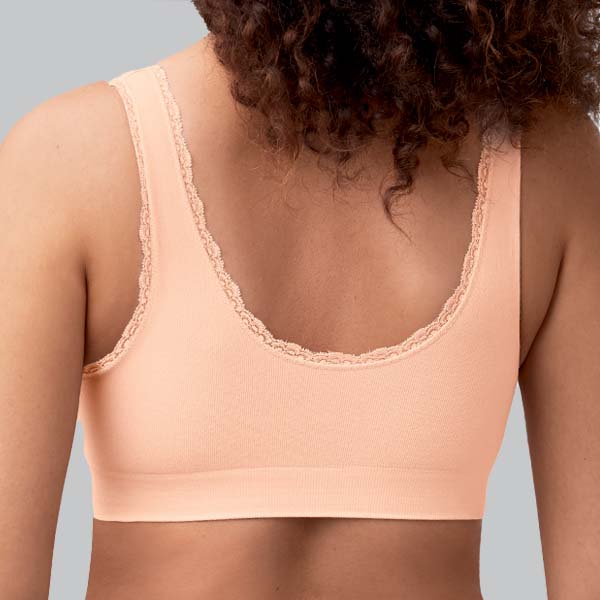 Back of the Amoena Kitty soft wireless pullover bra showing the higher U-shaped back, and medium underarm and straps.