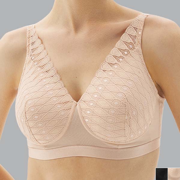 Front of the nude Megami Lotus adaptive wireless bra showing the lower cleavage and tapering lace straps.
