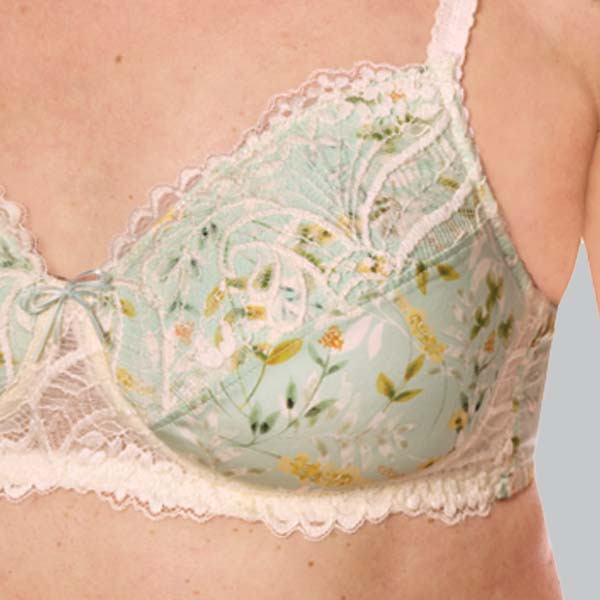 Front close-up of the Amoena Kalina padded wireless bra showing the lace upper cup and band, and lower cup floral fabric.