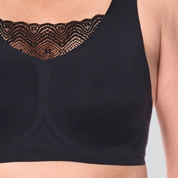 Close-up of the Amoena Esra padded wireless mastectomy bra showing the lace pattern and seamless cup and band.