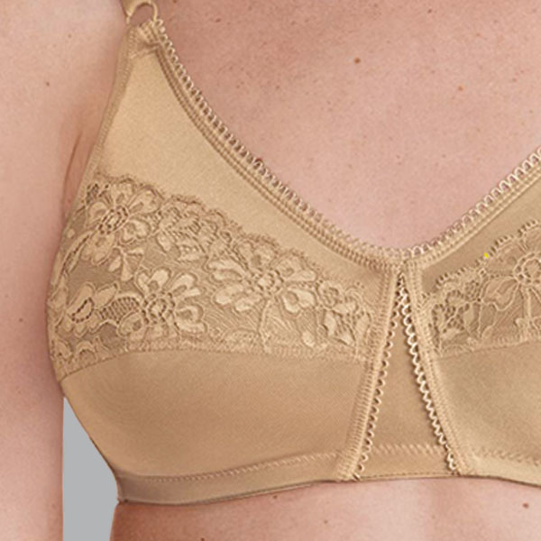 Close-up of the Anita Livia soft wireless mastectomy bra showing the cup lace, and neckline and centre panel embroidery.