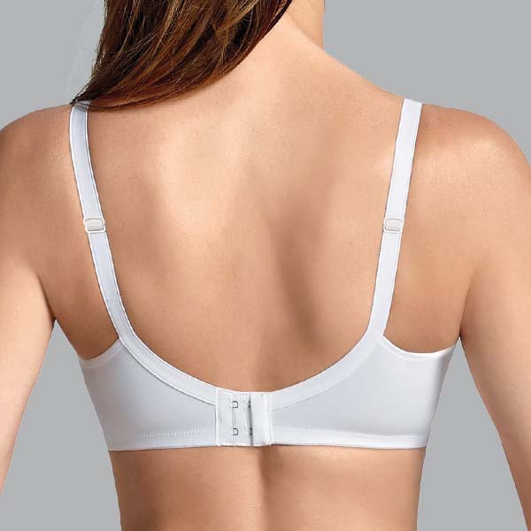 Back of the Anita Livia soft wireless mastectomy bra showing upward curved underarm band and U-shaped back band.